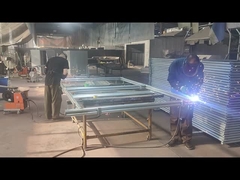 Temporary fence frame being welded