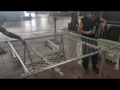 Chain link fence is being linked to the frame