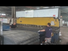 V mesh fence being bent by machine